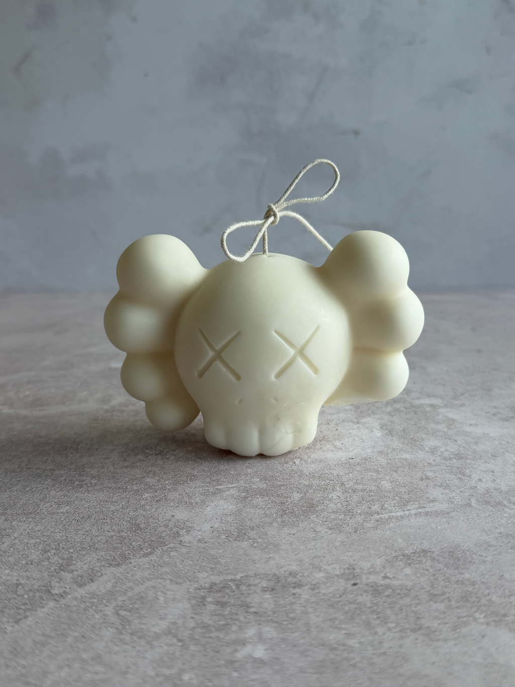 L KAWS