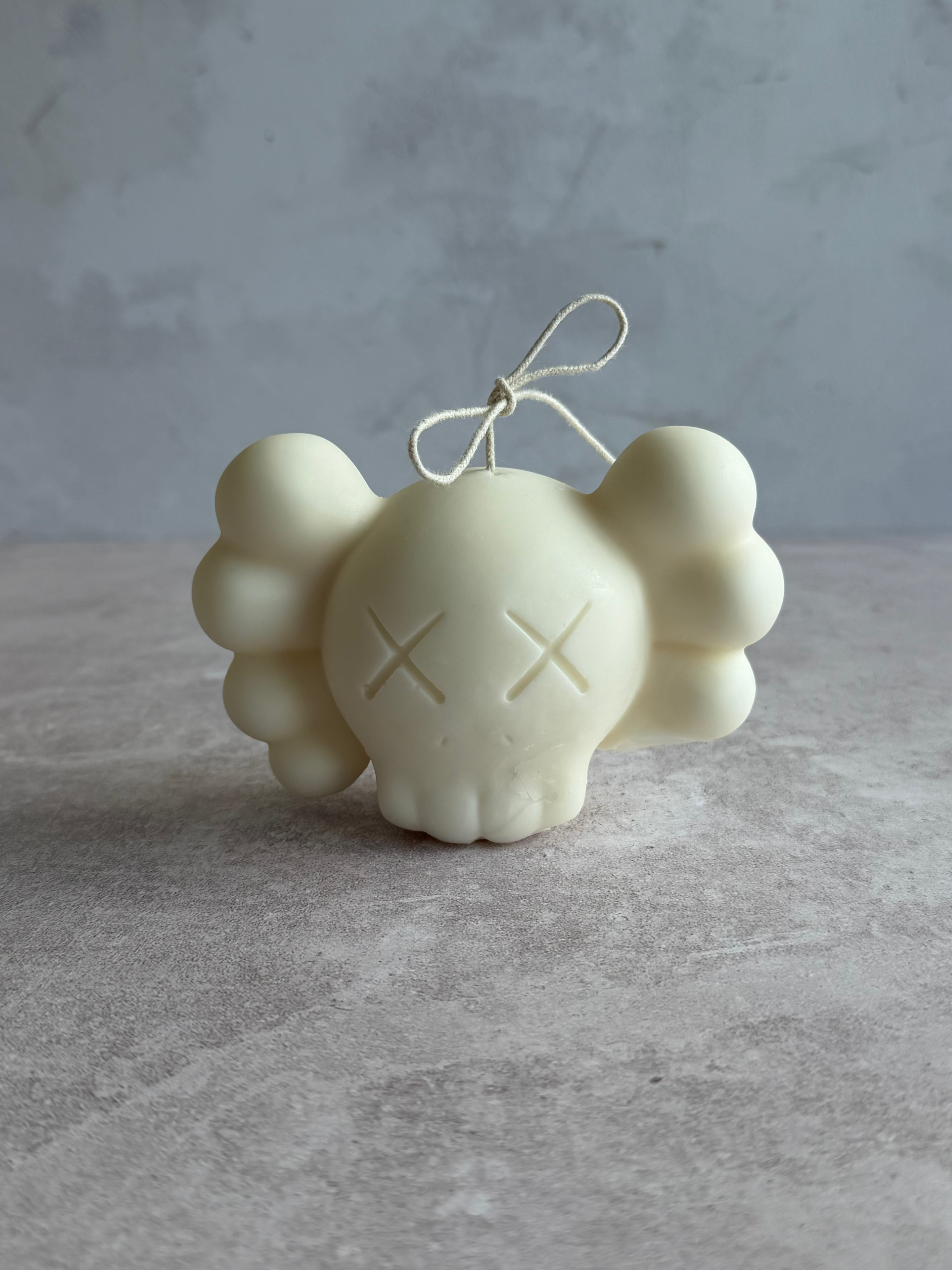 L KAWS